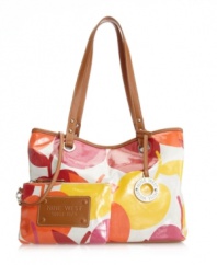 A cheerful print covers this classic tote design for a look that will spice up any ensemble. This eye-catching bag by Nine West features contrast trim, a signature charm and a detachable matching wristlet.