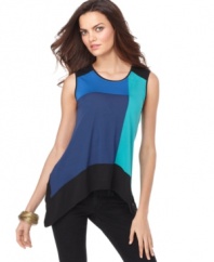 Add graphic edge to your skinny jeans with this colorblocked BCBGMAXAZRIA top for a look that's downtown-chic!