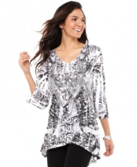 Style&co. gives an essential tunic a luxe makeover: check out the layered print, studs and rhinestone necklace in front!