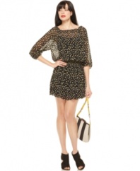 RACHEL Rachel Roy puts a fresh spin on the peasant dress with a shorter hem and a sheer printed fabric for graphic pop!