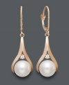 Take any look up a level when you add these sophisticated drop earrings. Cultured freshwater pearls (8-1/2 mm) add polish, while round-cut diamond accents add sparkle. Crafted in 14k rose gold. Approximate drop: 1-1/4 inches.