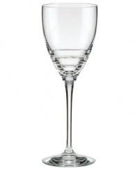 Three sharp lines juxtapose the fluid elegance of this wine glass from the Percival Place crystal stemware collection for a look of brilliant sophistication by kate spade new york.
