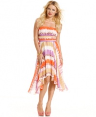 Asymmetrical design meets gorgeous print on this floaty, chiffon party dress from GUESS?.