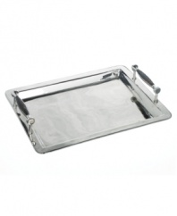 The alluring beauty of multi-faceted tortoiseshell-finished handles present a warm accent to clean stainless steel in this refined serving tray from Lauren by Ralph Lauren.