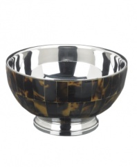 The alluring beauty of multi-faceted tortoiseshell presents a warm accent to clean stainless steel in this refined nut bowl from Lauren by Ralph Lauren.