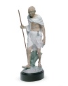 An homage to political activist and revered philosopher Mahatma Gandhi, this elaborate Lladro collectible depicts the historic figure in artfully glazed porcelain.