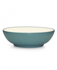 Make everyday meals a little more fun with Colorwave dinnerware from Noritake. Mix and match this rim soup bowl in turquoise and white with coupe and square pieces for a tabletop that's endlessly stylish.