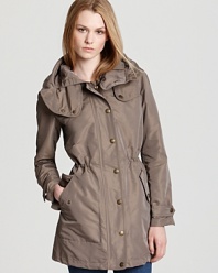 In a wear-with-all neutral, this utilitarian Burberry Brit anorak unzips to reveal a sleeveless interior warmer. Wear the vest solo for brisk fall days, then double up the layers as the cold settles in.