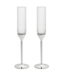 Echoing the elegant details of a wedding dress, Vera Wang's Grosgrain toasting flutes marry clean lines with lavish silver-plated stems and ribbon-inspired trim.