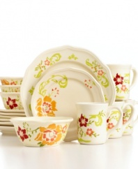 Garden fresh. Painterly blooms and scalloped detail give Gibson's Citrus Blossom dinnerware set a crafted look and feel to revive any casual table.