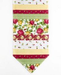 Kissed by a rose. Tiny buds, luscious blossoms and bright geometrics band together on the Rose Kiss table runner, featuring a machine washable blend to outfit your table with ease.