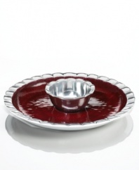 Full of surprises, this handcrafted chip and dip from the Simply Designz collection of serveware and serving dishes pairs sleek, polished aluminum with a fluted edge and lustrous burgundy enamel. A beautiful way to entertain!