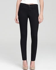 A minimalist design brings sleek sophistication to these inky-hued J Brand skinny pants.