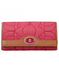 Quilted to perfection. This unique wallet by Fossil features a fun quilted exterior accented with vibrant signature plaque at front. Keep organized with its functional interior and easy access pockets for on-the-go style.