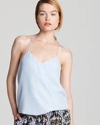 An elegant Tibi cami lends chic to spring's boldest trends and perennial staples alike, proving luxe versatility is always at your fingertips.