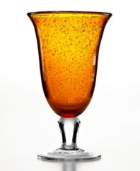 The eye-catching Iris iced tea glass makes a big impact in any setting with a rich amber hue and tiny bubbles trapped in dishwasher-safe glass. From Artland.