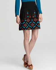 Vibrant tribal-print embroidery stands out on this Nanette Lepore skirt, lending runway-inspired style to the office and off hours.