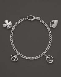 From Gucci's 1973 Collection, a sterling silver charm bracelet with four signature charms. Exclusive to Bloomingdale's.