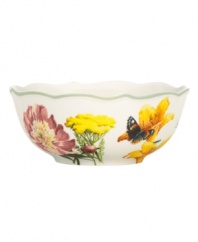 Garden party. The Floral Meadow all-purpose bowl brings eternal spring with a mixed bouquet rooted in resilient everyday porcelain. A scalloped edge and green banding add to the charm of the graceful mix-and-match Lenox dinnerware collection. Qualifies for Rebate