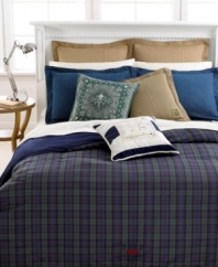 Sporty style meets casual comfort in Lauren Ralph Lauren's Blackwatch down-alternative comforter. A deep-hued plaid in pure cotton reverses to solid midnight blue to bring a stylish appeal to lounge-time. Finished with the Polo Ralph Lauren logo at the base and stitched edges on all four sides.