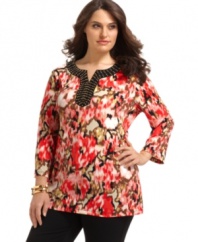 A beaded neckline elegantly finishes JM Collection's three-quarter sleeve plus size tunic top, featuring a bold print.