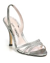 Rows of rhinestones add elegant sparkles to your every step. Pair with an LBD to really let them shine. By Caparros.