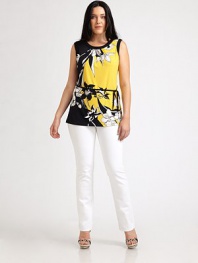 Let there be light. Slip into this vibrant, sleeveless top featuring a spectacular print and an impeccable silhouette, enhanced by a grosgrain belt.Round collarSleevelessSolid trimGrosgrain self beltAbout 29 from shoulder to hem95% polyester/5% elastaneMachine washImported