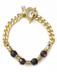 Vanessa Mooney makes the classic chain link bracelet feel completely cool with boldly colored beads.