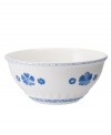 Vintage charm meets modern durability in the Farmhouse Touch vegetable bowl, featuring cornflower-blue laurels and blooms in delicately embossed porcelain from Villeroy & Boch.