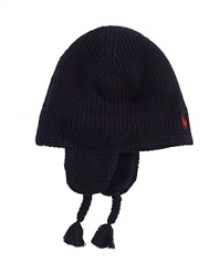 A sweet earflap hat is rendered in warm cotton with an embroidered pony at the front.