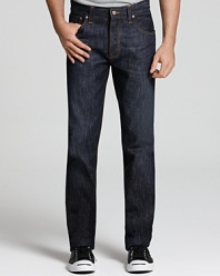 With a gradually tapered leg and a classic fit, this dark-rinse jean maintains a lean profile while remaining comfortable. Straight-slim leg opening.