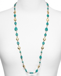 Embellished with striking turquoise beads and hammered stations, Lauren Ralph Lauren's link necklace is a striking adornment. Layer it over a crisp collar for a cool contrast.