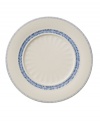 Vintage charm meets modern durability with these Farmhouse Touch dinner plates, featuring cornflower-blue laurels and bands in delicately embossed porcelain from Villeroy & Boch.