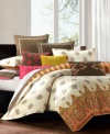 Add this decorative pillow to your Raja bed from Echo, featuring an intricate applique embroidery on a brown background.