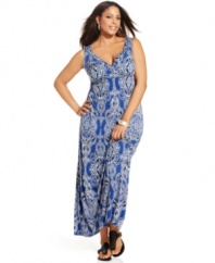 Relax in the stylish comfort of INC's sleeveless plus size maxi dress, highlighted by a vivid print.