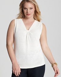 Work feminine flair into your daily repertoire with this Jones New York Collection tank that flaunts an elegant knotted neckline. Slip the style under sleek blazers or cropped cardigans for a chic finish.