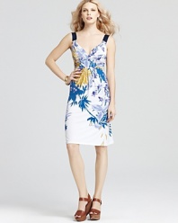 A vibrant palette and tropical florals awaken the sleek silhouette of this T Tahari dress for a style as picturesque as a postcard.