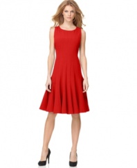 A flattering and feminine silhouette makes this Calvin Klein dress a must-have for the office and beyond. A perfect foundation to showcase chic accessories.