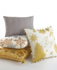 Golden christmas trees and snowflakes adorn this decorative pillow from Martha Stewart Collection, featuring embroidered Joy lettering on the face. Finished with decorative trim for an added burst of holiday spirit.