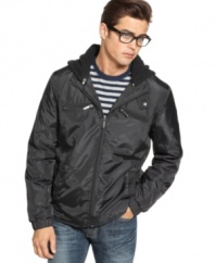 Getting caught in the rain is a thing of the past when you're suited up in the ultra-sleek wear-anywhere design of this Kenneth Cole Windbreaker, complete with a detachable fleece hood.