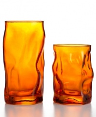 Glassware that gets noticed. Bormioli Rocco teams a funky organic shape and hot-orange hue in this easy-care set of highball glasses made for modern tables.