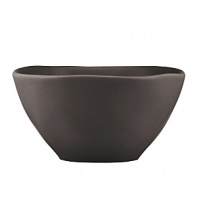 Featuring an organic shape and a matte glaze finish, this bowl is thoroughly modern and imparts natural sophistication.