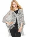 A relaxed poncho-style shape and fringe trim makes this Kensie sweater perfect for a summer boho look!
