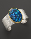 Captivating Paua shell in 24K yellow gold lends statement chic to this hammered sterling silver cuff from Gurhan.