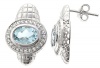 Sterling Silver Earrings With Bezeled Oval Swiss Blue Topaz And White Topaz Pave