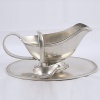 The Tavola Gravy Boat, Tray & Ladle makes a great addition to any dinner table.Measures 4.5 x 9.75.
