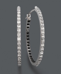 Expect the unexpected. Onlookers will do a double take when they catch a glimpse of these non-traditional hoop earrings. White diamond accents decorate the outside, while black diamond accents highlight the inside. Crafted in 14k white gold. Approximate diameter: 1-2/16 inches.