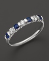 Diamonds and sapphires in a 14K white gold ring.