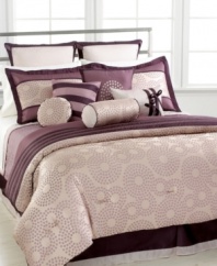 Come full circle. Classic polka dots are transformed into a modern circular pattern in this Polka Dot Comforter set, featuring a lovely purple palette that offers a contemporary look for your room. Comes complete with all the elements you need for a new look including a pile of plush decorative pillows.