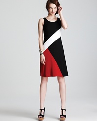 Featuring bold color blocking, this Karen Kane dress lends graphic edge to your everyday style. Sleek black accessories pull the elements together for modern sophistication.